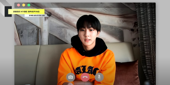 Jungwon of Enhypen speaks during an online briefing held Thursday on YouTube. [SCREEN CAPTURE]