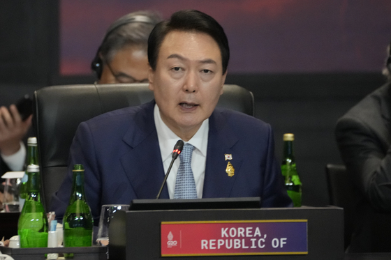Korean President Yoon Suk-yeol speaks during the G20 leaders’ summit in Bali, Indonesia Tuesday. [AP/YONHAP]