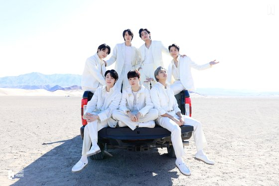 BTS members pose for a photo during the shooting of "Yet To Come" in June this year. [SCREEN CAPTURE]