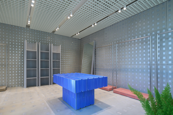 Interior items created by artist Lee Kwang-ho, which include shelves, hangers and a table [BEAKER]