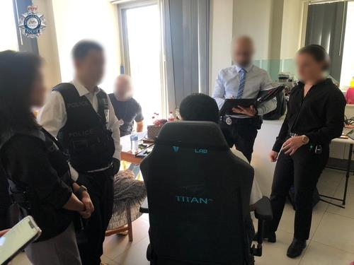Photo shows ″L,″ the key suspect arrested in Australia in an online sex abuse crime targeting underage people. [YONHAP] 