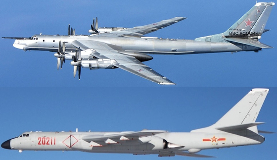 A Russian TU-95 bomber, above, and a Chinese H-6 bomber, bottom. [SCREEN CAPTURE]
