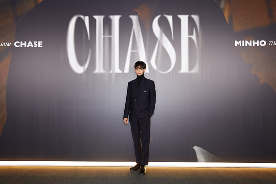 Minho poses during Tuesday's online press conference. [SM ENTERTAINMENT]