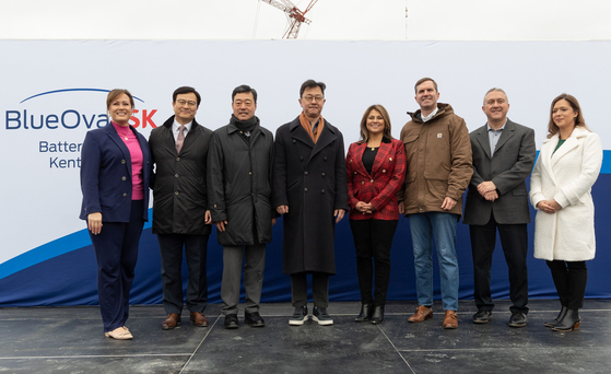 From left to right, Kentucky Lt. Gov. Jacqueline Coleman, BlueOval SK CEO David Hahm, SK On CEO Jee Dong-seob, SK Group Executive Vice Chairman Chey Jae-won, Liliana Ramirez, Ford's Global Director of Workforce Development, Kentucky Gov. Andy Beshear, Dave Nowicki, Ford Director of Manufacturing, EV Programs; and Lisa Slaven, Hardin County Schools Transition Readiness Director, stand for a photo at the groundbreaking ceremony of BlueOval SK Battery Park in Glendale, Kentucky, on Dec. 5. [YONHAP]