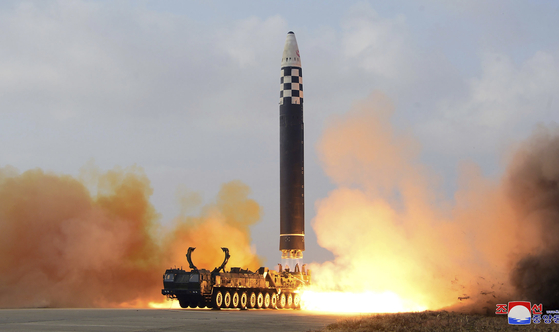 North Korea test fires a Hwasong-17 intercontinental ballistic missile at Pyongyang International Airport on Nov. 18. [YONHAP]