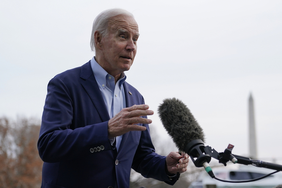 U.S. President Joe Biden speaks with reporters after stepping off Marine One on the South Lawn of the White House in Washington on Monday. [AP/YONHAP] 