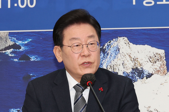 Lee Jae-myung, head of the Democratic Party, speaks at a ceremony at the National Assembly in western Seoul on Friday. [YONHAP] 
