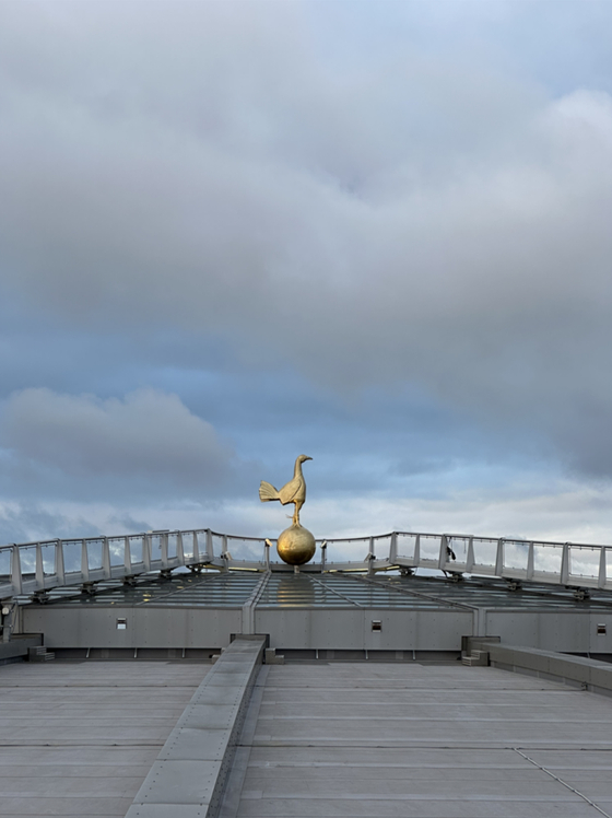 The iconic Tottenham Hotspur cockerel is visible on the roof of the stadium in north London on Dec. 5. [JIM BULLEY]