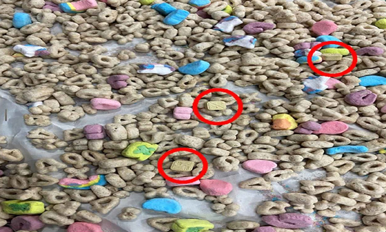 MDMA, or ecstasy, is seen mixed with cereal. [INCHEON DISTRICT PROSECUTOR'S OFFICE] 