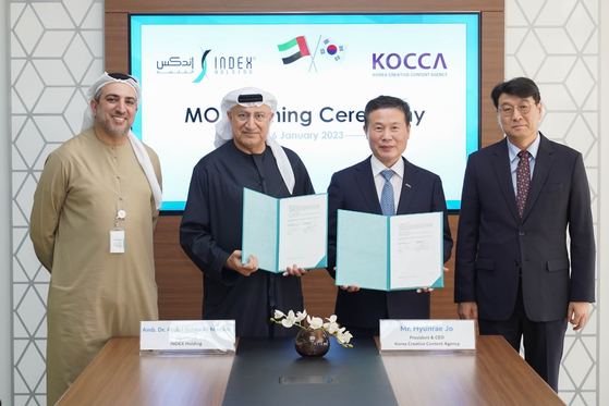 From left, Index Holding's Vice Chairman Anas Al Madani, Chairman Abdul Salam Al Madani, Kocca President Jo Hyun-rae and Moon Byung-jun, the new Consul General of the Republic of Korea in Dubai, signed memorandums of understanding to foster cultural exchanges between the two countries through content. [KOCCA]
