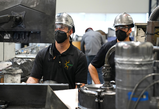 Urbix employees work at the plant in Arizona. [URBIX]
