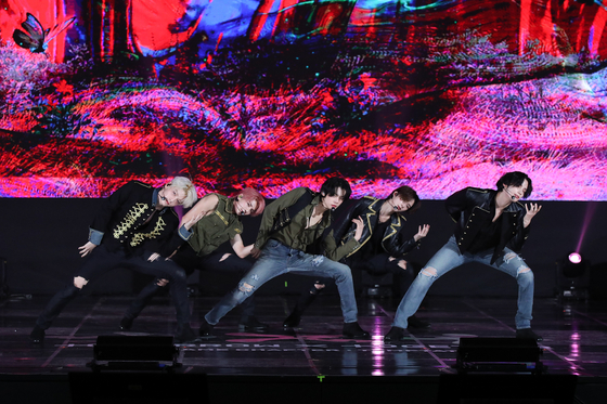 Boy band Tomorrow X Together performs its new lead track "Sugar Rush Ride" during a showcase on Jan. 26, 2023 for its fifth EP "The Name Chapter: Temptation" at the Coex Auditorium in Gangnam District, southern Seoul. [BIGHIT MUSIC]