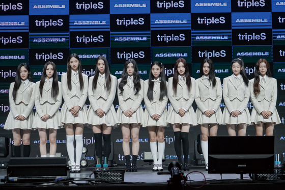 Girl group tripleS poses for the camera at the showcase of its debut EP ″Assemble.″ [MODHAUS]