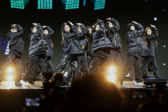 Girl group tripleS performs its debut lead track ″Rising″ during a showcase on Feb. 13 for its debut EP ″Assemble″ at Blue Square in Yongsan District, central Seoul. [MODHAUS] 
