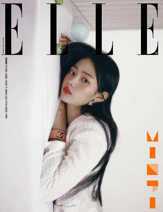 NewJeans' Minji landed her first solo magazine cover for Elle Korea's March edition. On Tuesday she was named ambassador for Chanel Korea. [ELLE]