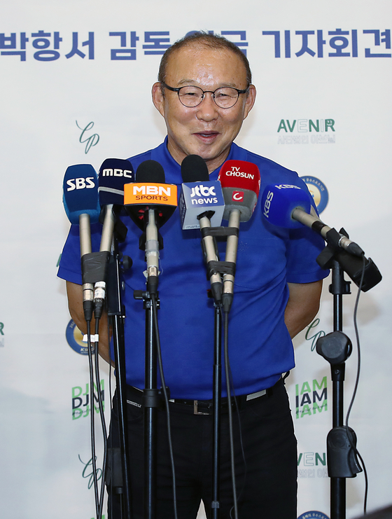 Park Hang-seo talks to reporters at Incheon International Airport in Incheon on Tuesday following his arrival in Korea. [NEWS1] 