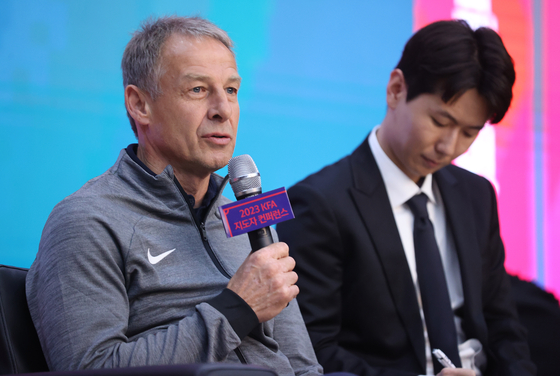Jurgen Klinsmann, left, speaks at the Korea Football Association (KFA) Coach Conference held at Goyang International Youth Cultural Center in Goyang, Gyeonggi on Wednesday. [YONHAP] 