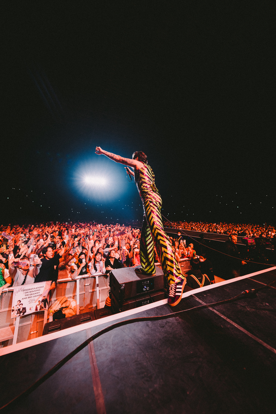 British singer Harry Styles performs at the KSPO Dome in southern Seoul on Monday. [LLOYD WAKEFIELD]
