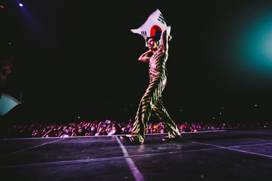 British singer Harry Styles performs at the KSPO Dome in southern Seoul on Monday. [LLOYD WAKEFIELD]
