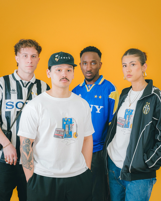 Models pose in a range of Art of Football products.  [ART OF FOOTBALL]