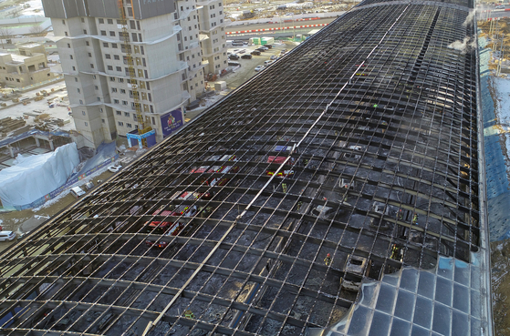 The charred remains of a tunnel in Gwacheon, Gyeonggi, on Dec. 29, 2022, after it was burned by a fire that started from a garbage truck earlier that day [YONHAP]