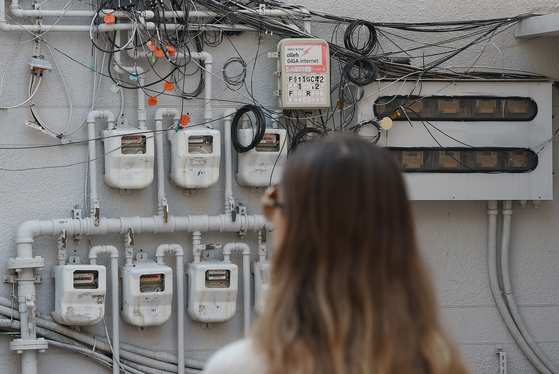 Electricity meters affixed to a wall in Seoul on Friday [YONHAP]