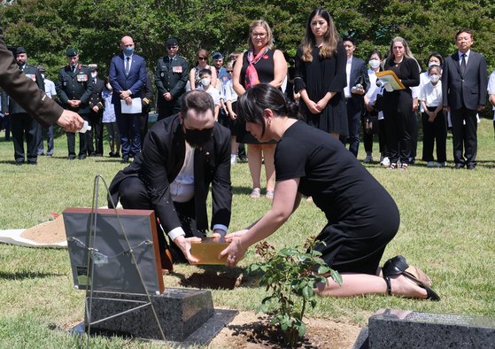 Remains of John Robert Cormier, a Canadian veteran of the 1950-53 Korean War, laid to rest at the UN Memorial Cemetery in Busan on June 21, 2022. [SONG BONG-GEUN] 