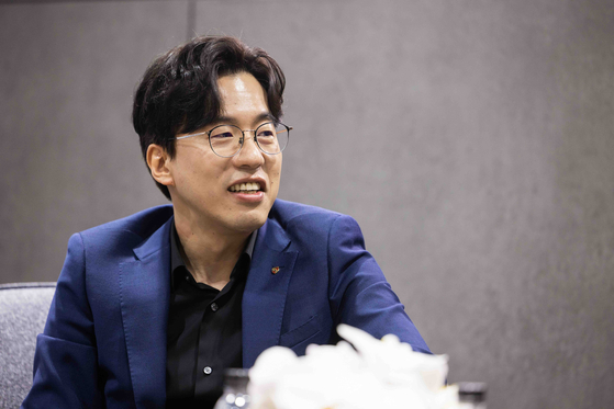 Chung Woo-sung, a senior exterior designer at Porsche, speaks during a recent interview with the Korea JoongAng Daily at Kintex, Gyeonggi. [PORSCHE KOREA]  
