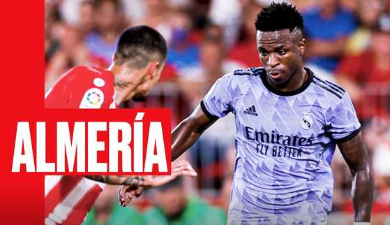 Real Madrid's Vinicius Junior, right, in action during a La Liga match against Almeria at the Power Horse Stadium in Almeira, Spain on Aug. 15, 2022. [ONE FOOTBALL] 