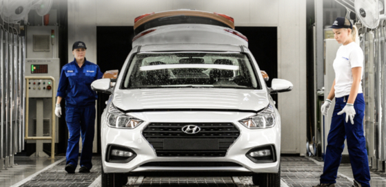 Hyundai Motor employees work at its plant in St. Petersburg, Russia. [SCREEN CAPTURE]
