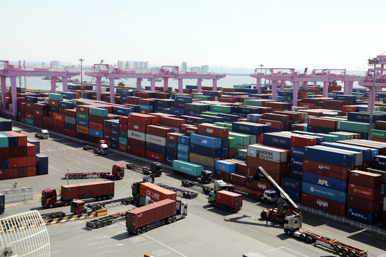 Container boxes are stacked at a port in Yeonsu District, Incheon, in March. [NEWS1]