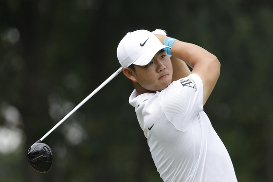 Tom Kim plays his shot from the ninth tee during the second round of the AT&T Byron Nelson at TPC Craig Ranch on May 12 in McKinney, Texas.  [GETTY IMAGES]