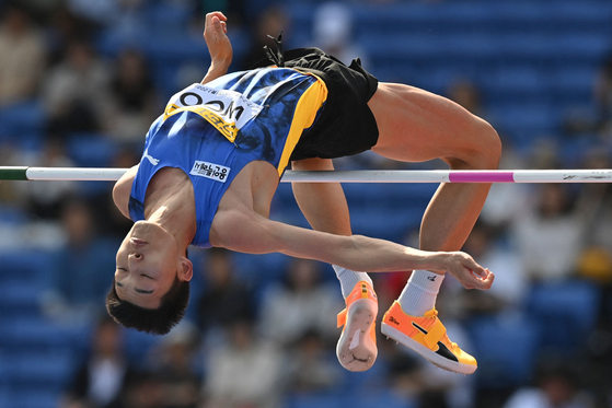 Woo Sang-hyeok competes in the men's high jump at the Seiko Golden Grand Prix in Yokohama, Japan, on Sunday. [AFP/YONHAP]