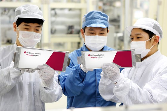 LG Energy Solution researchers check the company's batteries for electric vehicles at its Ochang plant in North Chungcheong. [LG ENERGY SOLUTION]