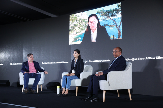From left: Doug Schorzman, Asia editor of The New York Times; Ashley Bang, a principal consultant at the Biodiversity Consultancy; Sandeep Sangupta, global policy lead for climate change at the International Union for Conservation of Nature; and Patricia Ricard, on screen, chair of Paul Ricard Oceanographic Institute in a panel discussion themed ″Protecting Our Coasts: The Promise of Nature-Based Resilience″ on May 26 during The New York Times A New Climate event in Busan. [PARK SEONGGWAN]