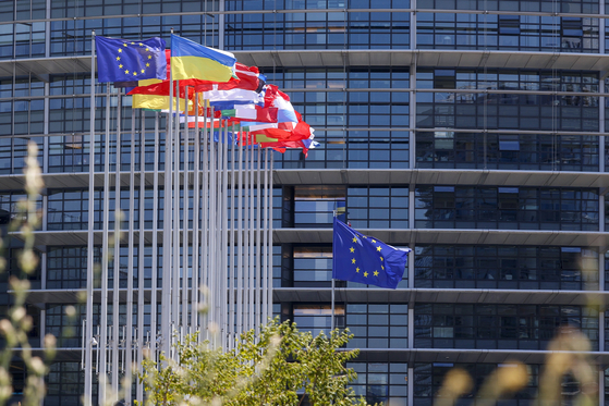 Flags in front of the European Parliament in Strasbourg, France, on Tuesday [EPA/YONHAP]
