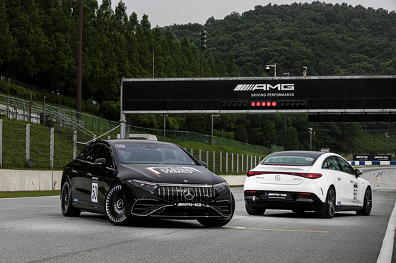 Mercedes-AMG EQE, left, and EQS on track [MERCEDES-BENZ KOREA] 