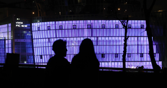 The Some Sevit, or the Sevit islets in Banpo Han River Park, is lit in purple on June 12, as part of the ″2023 BTS Festa″ held in celebration of K-pop boy band BTS's 10th anniversary of debut. [YONHAP]