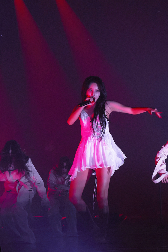 Soyeon performs during (G)I-DLE's second world tour, ″I am FREE-TY″ on Saturday at Jamsil Gymnasium in Songpa District, southern Seoul. [CUBE ENTERTAINMENT]       
