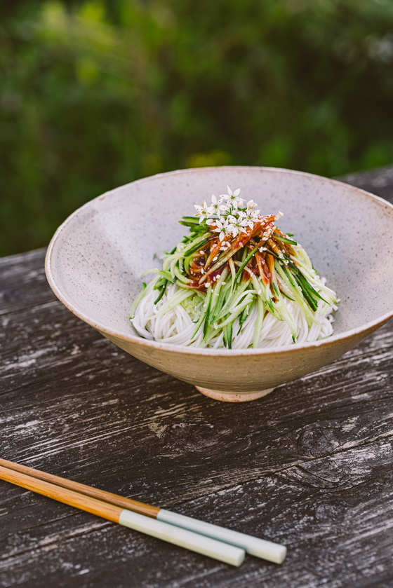 Cold wheat noodles with cucumber whose receipe is outlined in Ae Jin Huys' latest cookbook "Taste Korea" [SUSTAINWORKS - KIM ZINHO]