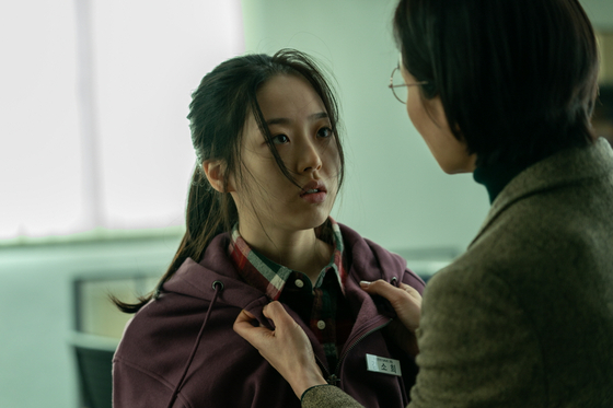 Actor Kim Si-eun as teenage worker So-hee in the social commentary film ″Next Sohee″ (2022) [TWIN PLUS PARTNERS]