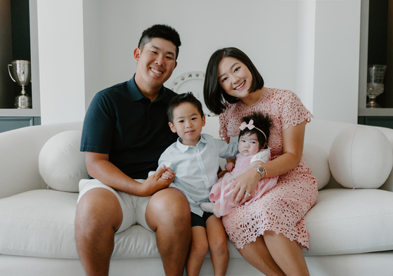 An Byeong-hun poses with his family  [PGA TOUR]
