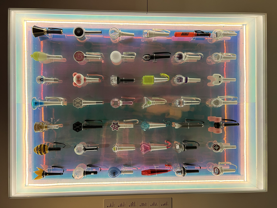 A collection of light sticks that represent each K-pop group, including BTS, SHINee, Seventeen and Blackpink. Most of them are connected via internet-of-thing technology. [SHIN MIN-HEE]