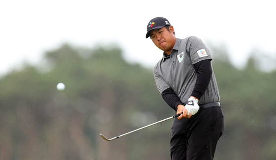 An Byeong-hun plays his second shot on the 9th hole during Day Two of the Genesis Scottish Open at The Renaissance Club in Berwick, Scotland on July 14.  [GETTY IMAGES]