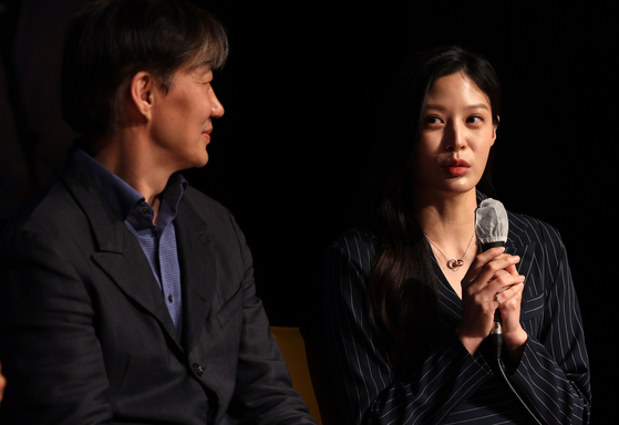 Cho Min, right, with her father Cho Kuk, former Justice Minsiter during the Moon Jae-in government, speaks at an event in Busan in April. [YONHAP]