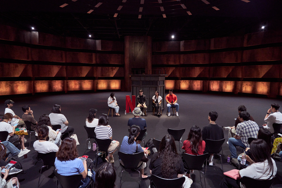 Reporters attend a press event to introduce the set of the second season of the popular Netflix reality television show at Kintex in Goyang, Gyeonggi, on Wednesday. [NETFLIX]