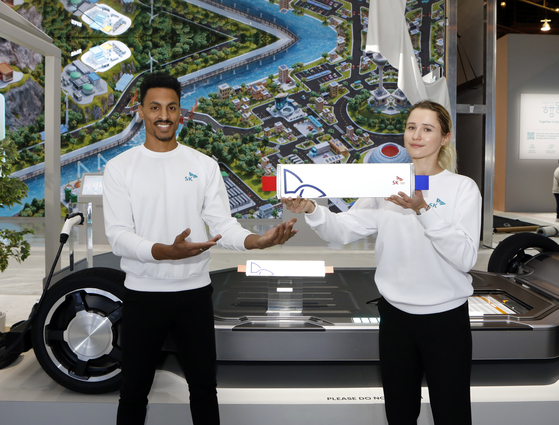 Models pose with SK On's pouch-type batteries at the CES 2023 held in Las Vegas in January. [SK ON]