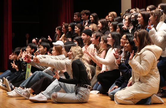 First-year international students at Korea University pose for a photo during orientation day. [NEWS1]