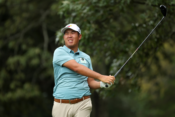 An Byeong-hun plays his shot from the seventh tee during the third round of the FedEx St. Jude Championship at TPC Southwind in Memphis, Tennessee, on Saturday. [GETTY IMAGES]