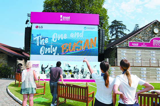LG Electronics puts up advertisement board of the Busan expo at the Amundi Evian Championship, taking place in Evian, France. [LG ELECTRONICS]